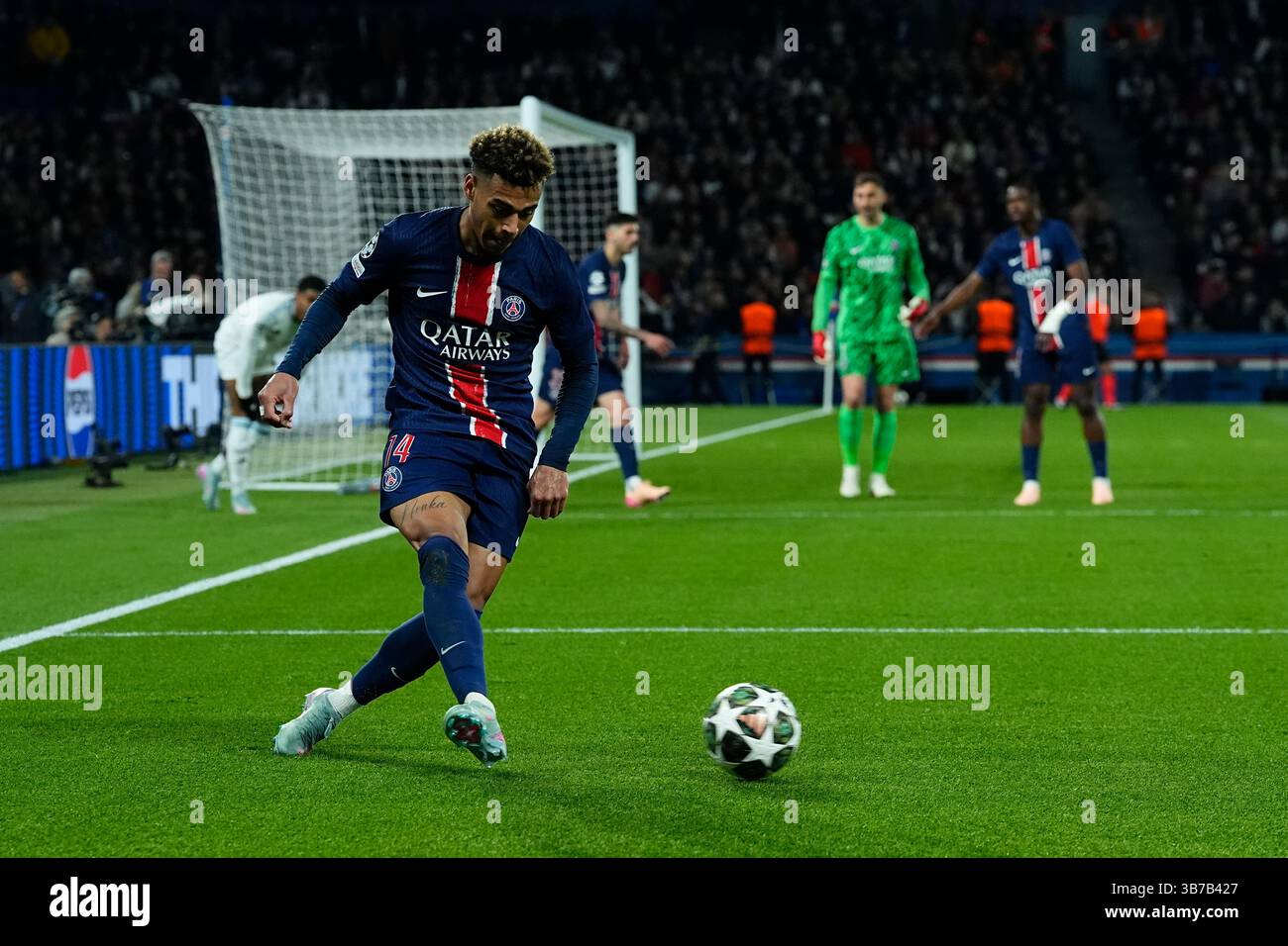 PARIS, FRANCE - APRIL 9: Desire Doue #14 (PSG) makes a defensive pass ...