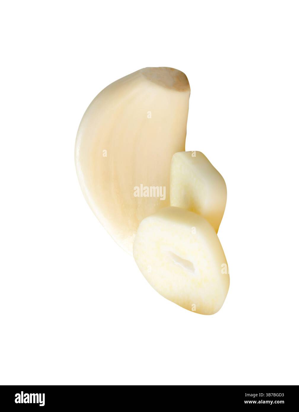 Top view of peeled garlic cloves with slices in stack are isolated on ...