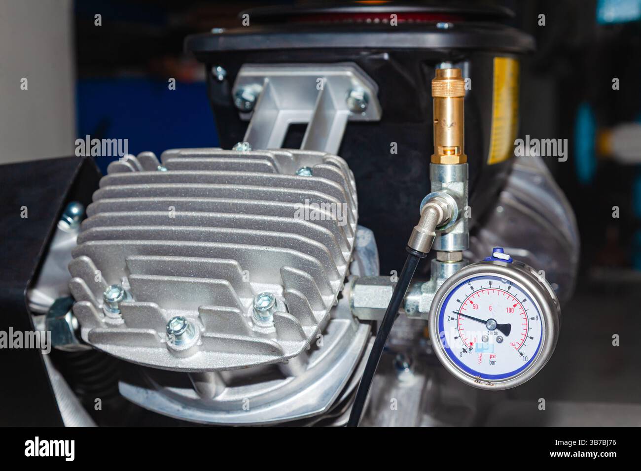 Installed and connected industrial air compressor. Stock Photo