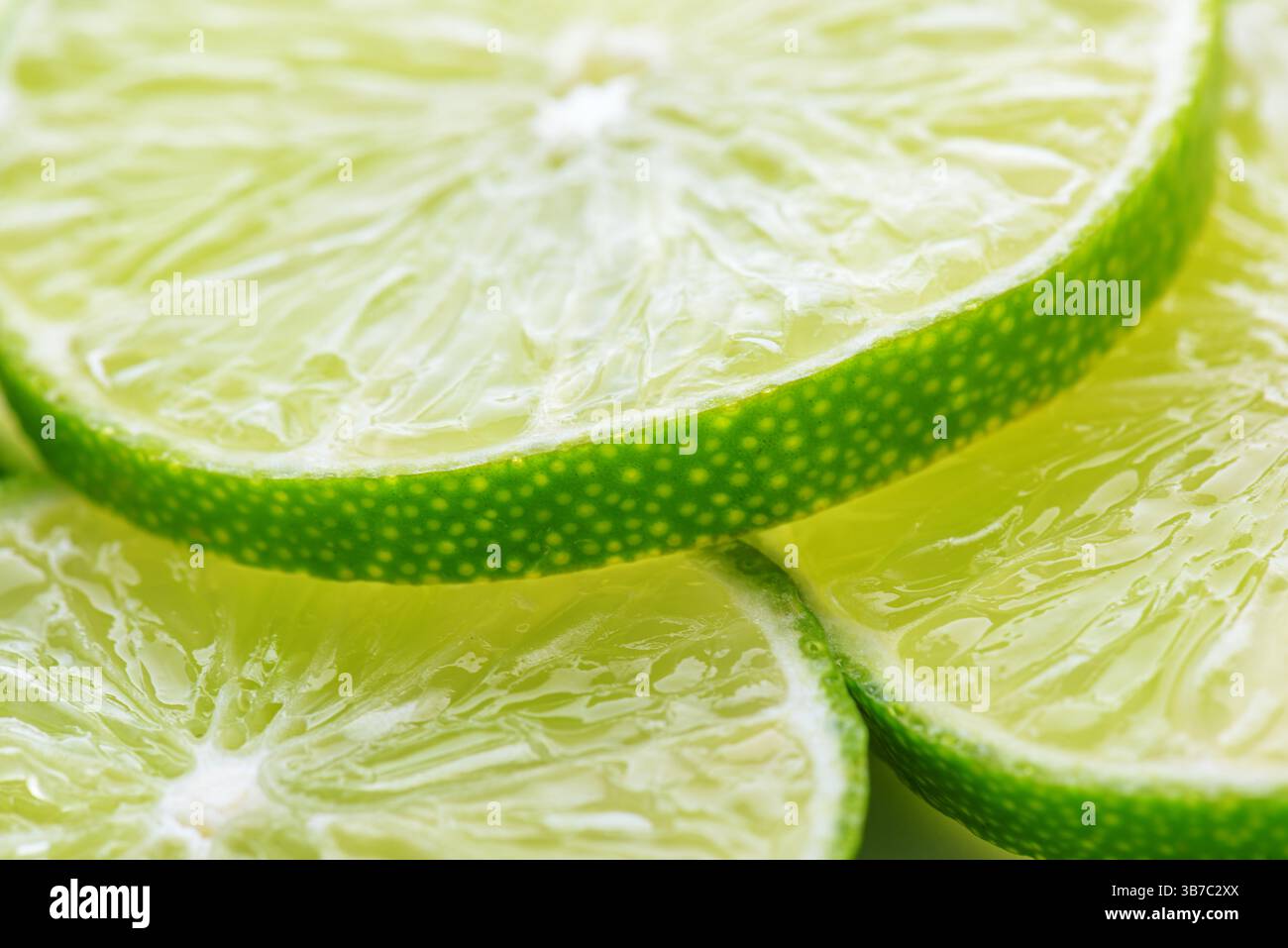 Closeup view of sliced fresh juicy lime Stock Photo - Alamy