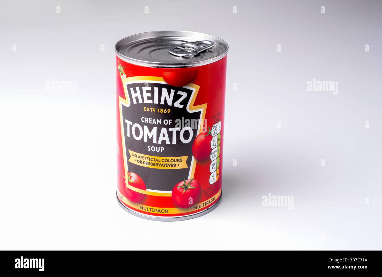 A single can of Heinz Tomato Soup against a plain white background Stock Photo