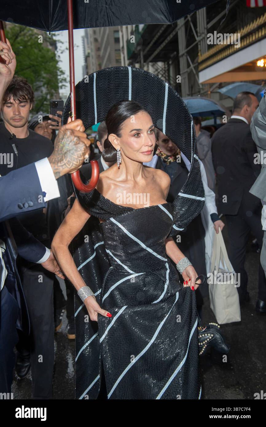 Demi Moore wearing Thom Browne departs the Pierre Hotel for 2025 Met ...