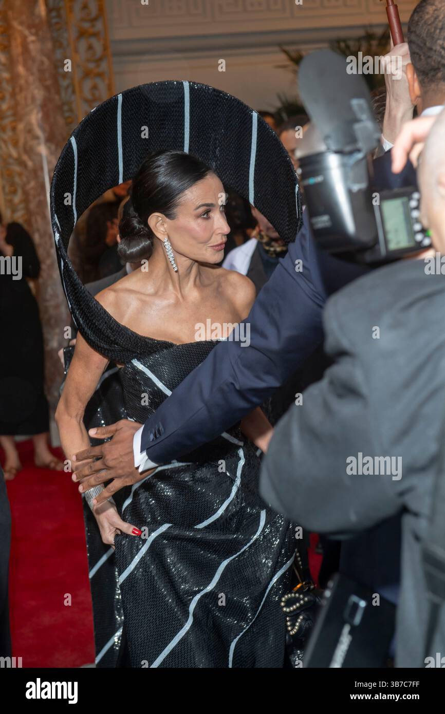 Demi Moore wearing Thom Browne departs the Pierre Hotel for 2025 Met ...