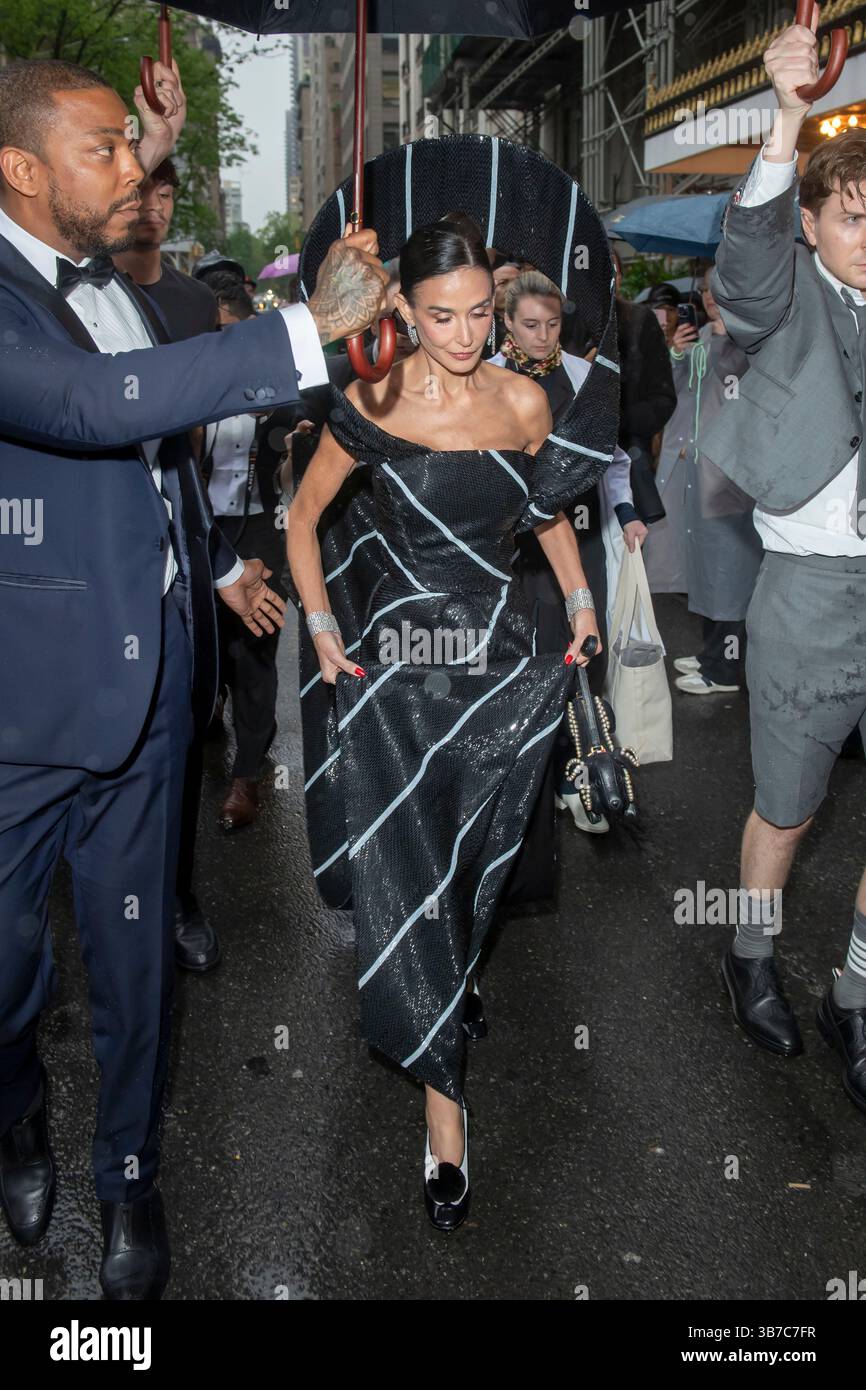 Demi Moore wearing Thom Browne departs the Pierre Hotel for 2025 Met ...