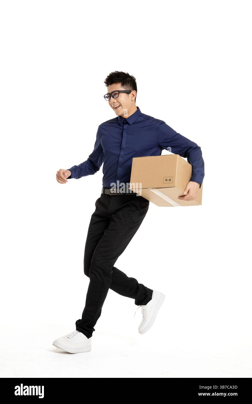 A tech-savvy young professional using AR glasses for efficient package delivery. Stock Photo