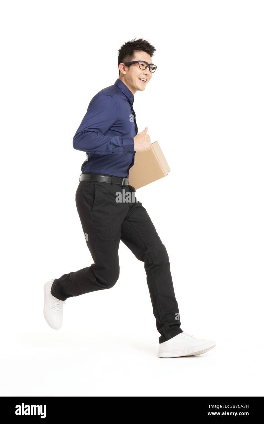 A tech-savvy young professional using AR glasses for efficient package delivery. Stock Photo