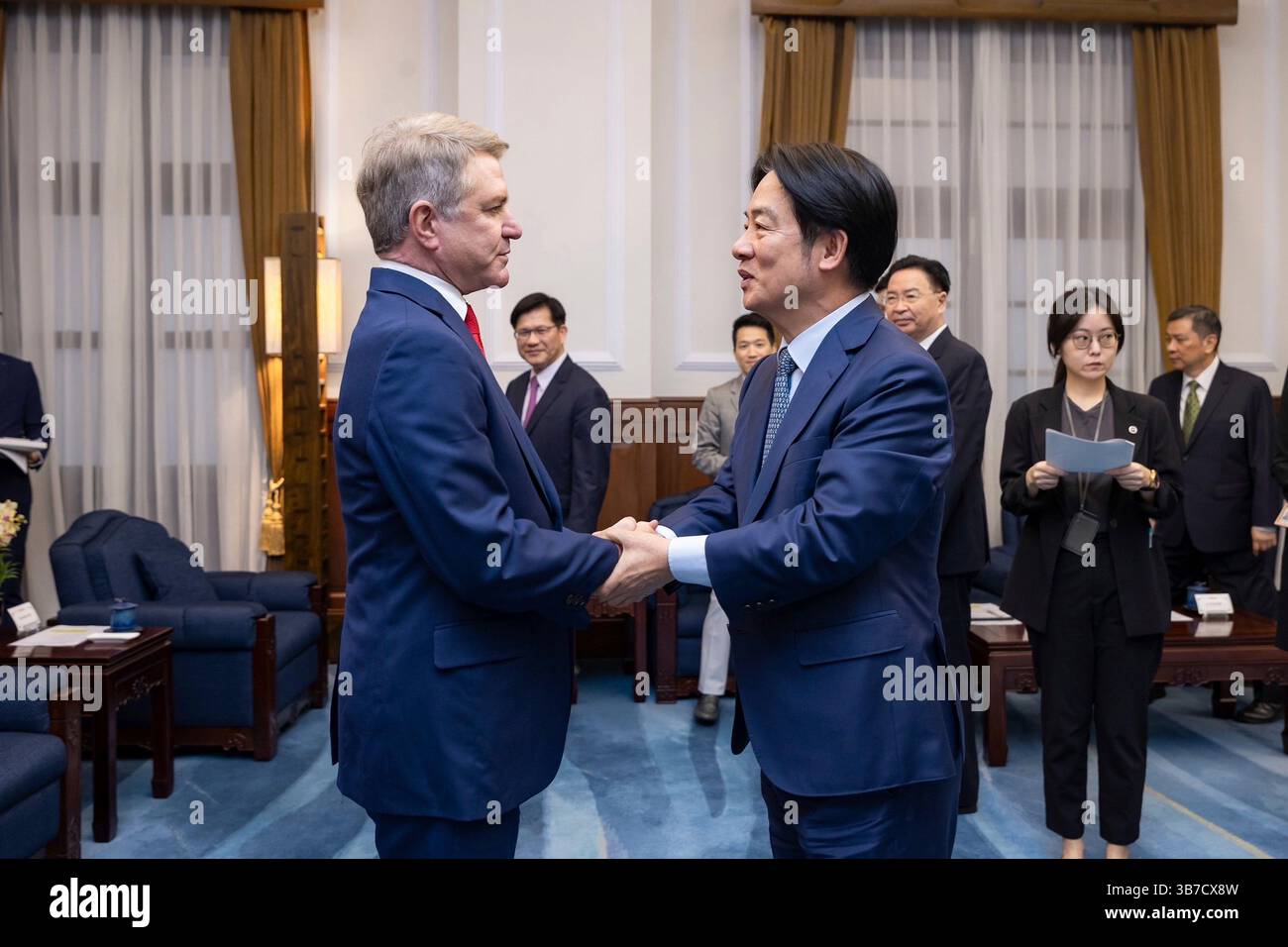 May 27, 2024, Taipei, Republic of China: U.S Rep. Michael McCaul, R-TX, left, part of a bipartisan delegation, shakes hands with Taiwan President Lai Ching-te, right, before the meeting at the Presidential Office, May 27, 2024, in Taipei, Taiwan. The visit was the first by American politicians since Lai took office last week. (Credit Image: © Liu Shu Fu/Taiwan Presidential/Planet Pix via ZUMA Press Wire) Stock Photo