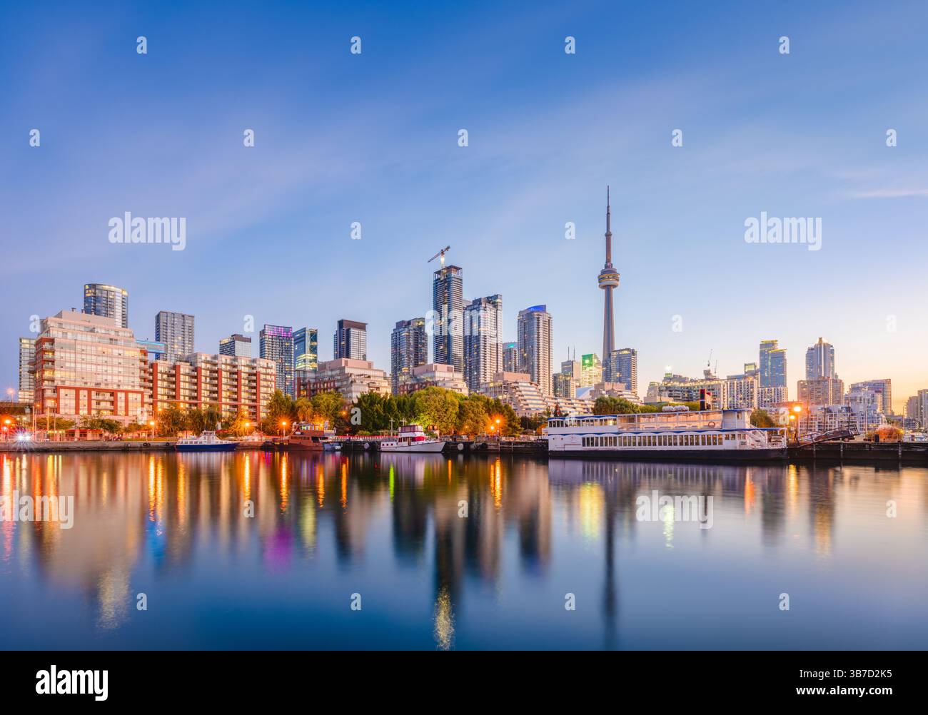 Toronto, Ontario, Canada downtown city skyline on Lake Ontario at twilight. Stock Photo