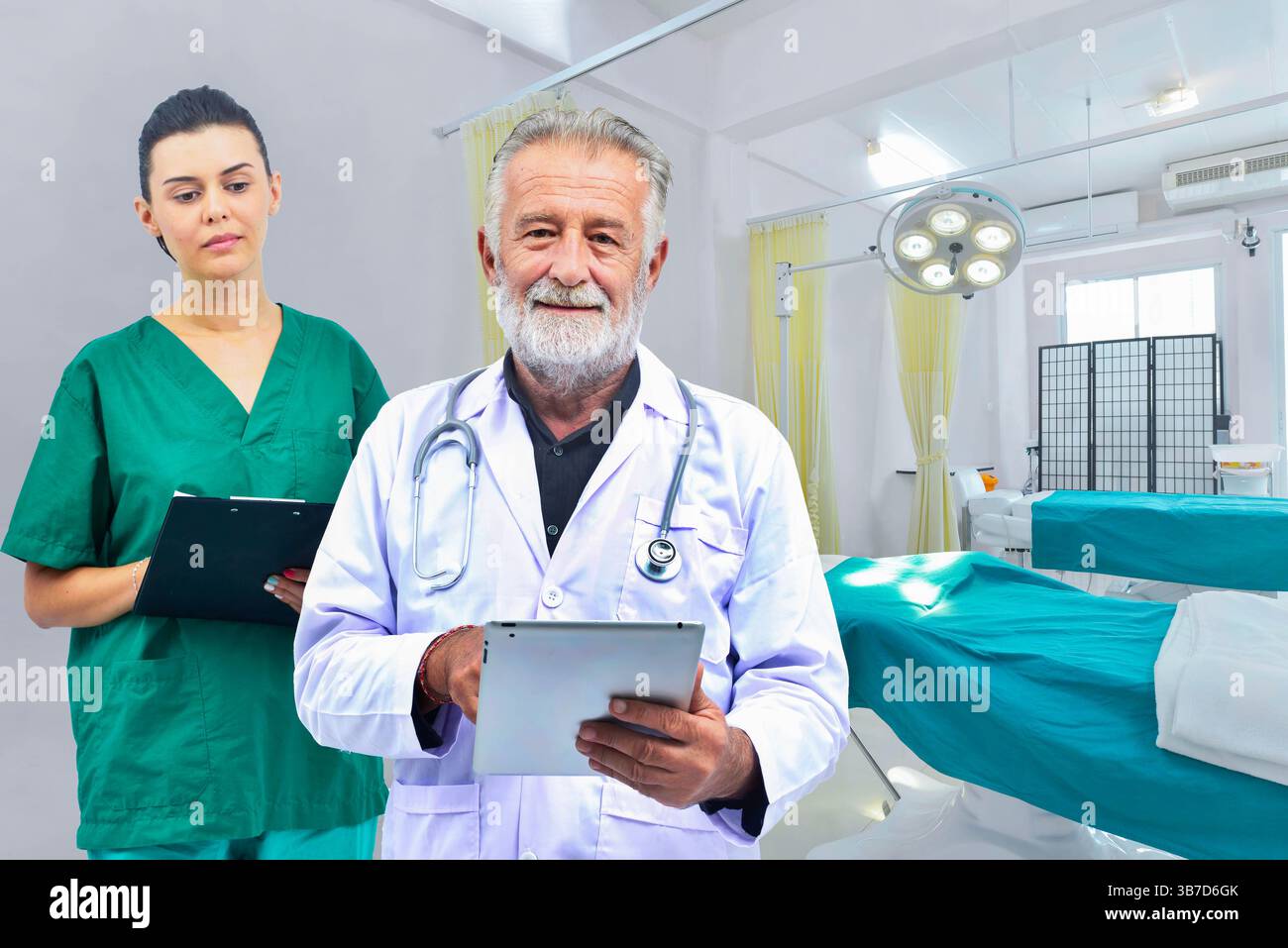 Senior doctor and young nurse with patient chart on operating room ...