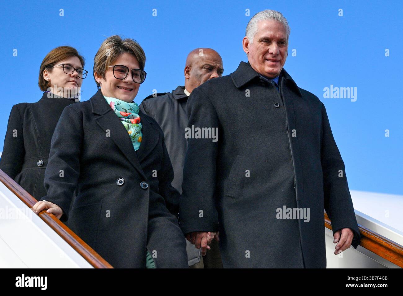 Cuba's President Miguel Diaz-Canel, right, and his wife Lis Cuesta ...