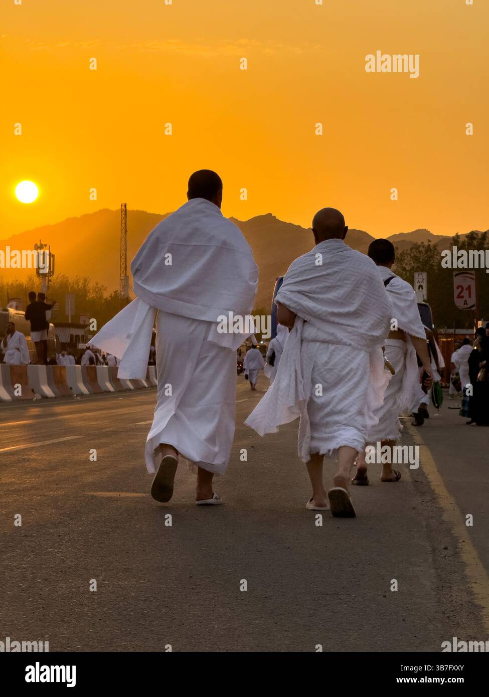 Makkah, Saudi Arabia, 15 June 2024: Many Hajj pilgrims are walking on the Arafat field. Mount Arafat (Jabal Arafat, Mountain of Mercy') is a forgivene - Smartphone Captured Stock Image
