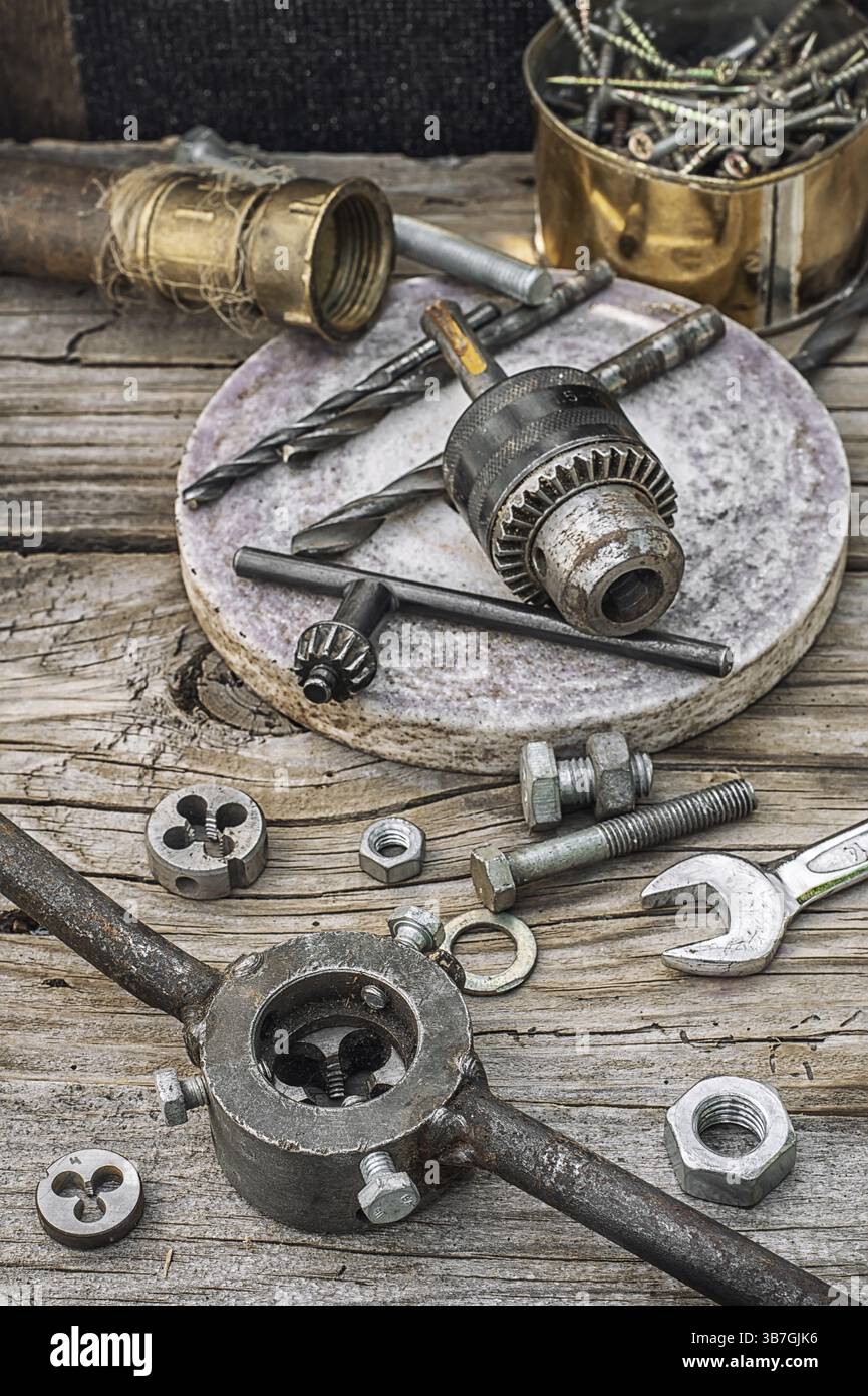 Set of old tools of the keys, screws and drills Stock Photo