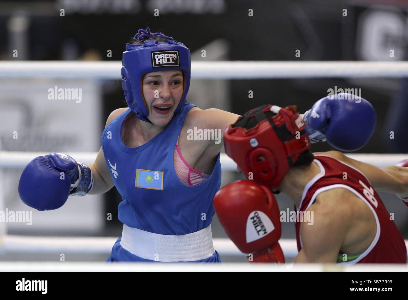 Sofia, Bulgaria. 27th February, 2021. Stoyka Krasteva (red) of Bulgaria and Angelina Lukas of Kazakhstan fight in their final round of Fly (W51kg) cat Stock Photo