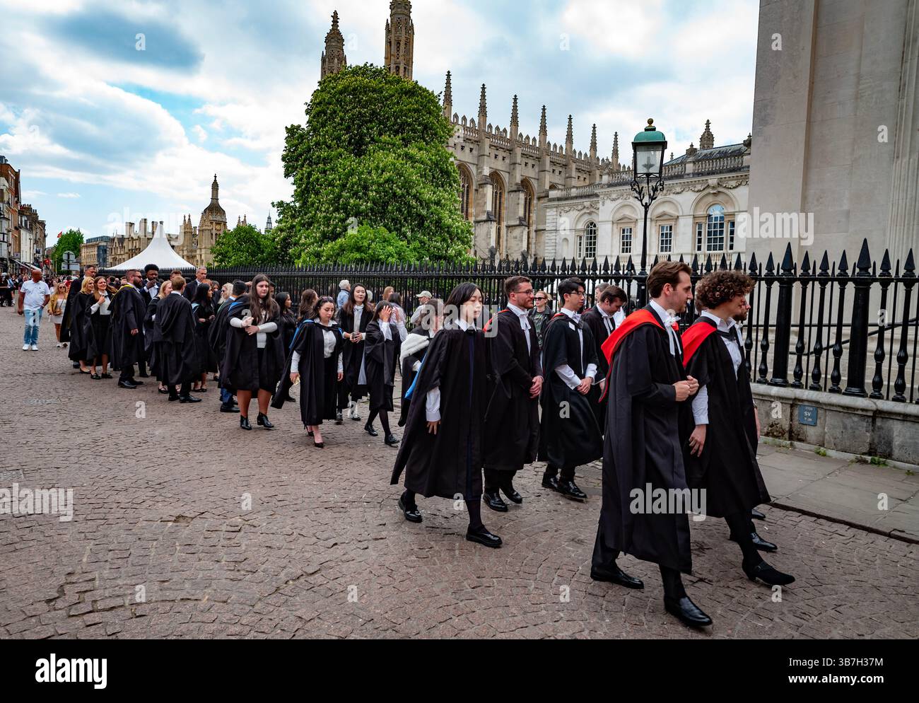 Cambridge University Graduation Day on 3 May 2025. Students queue along ...