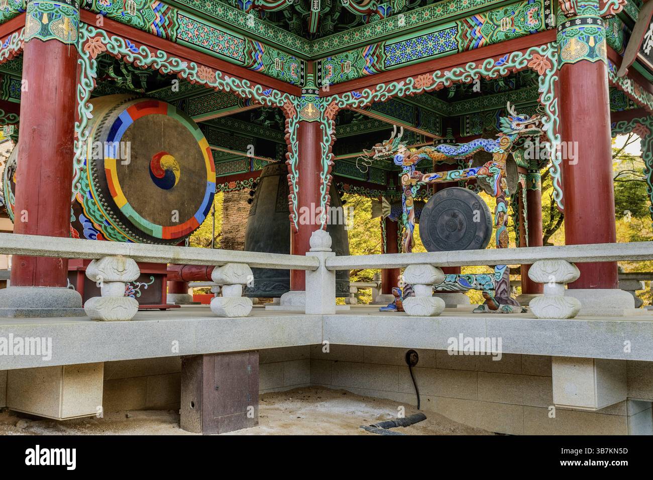 Gongju, South Korea. October 18, 2020: Drum, bell and gong in pavilion in mountainside temple in Korea Stock Photo