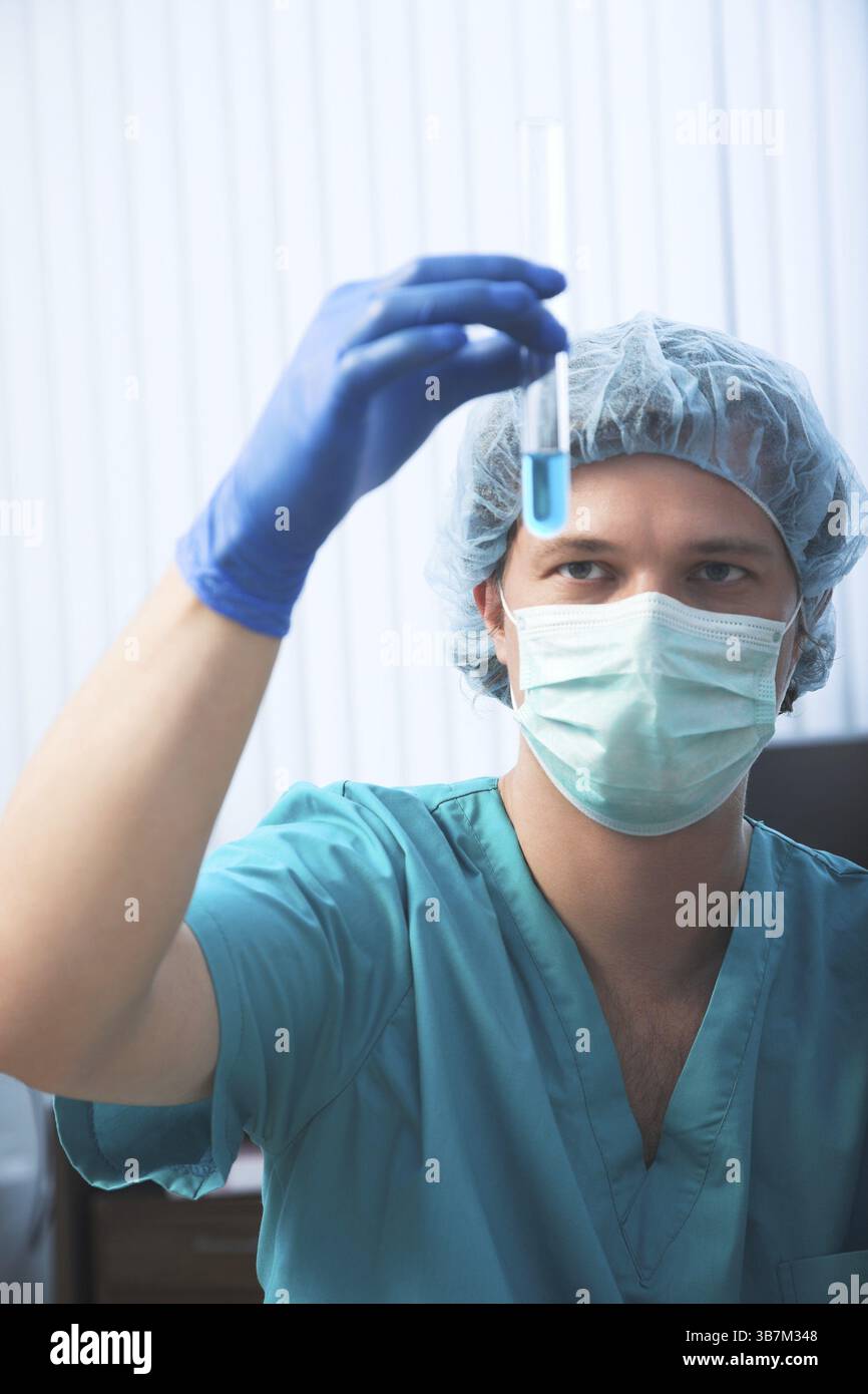 Scientist doing DNA test in modern laboratory Stock Photo