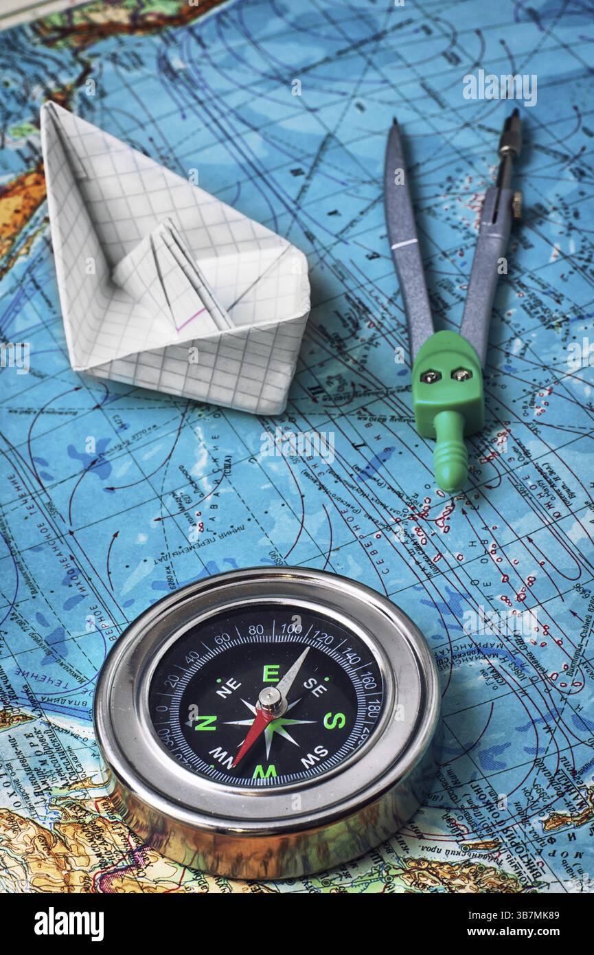 Compass, map of the main tourist instruments Stock Photo - Alamy