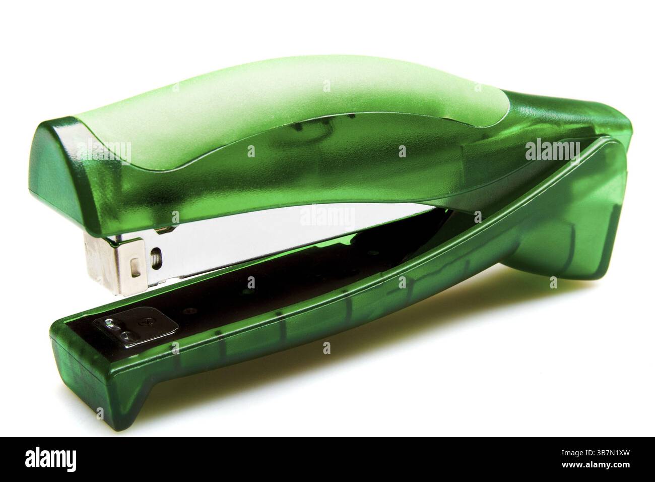 Green stapler on white background Stock Photo