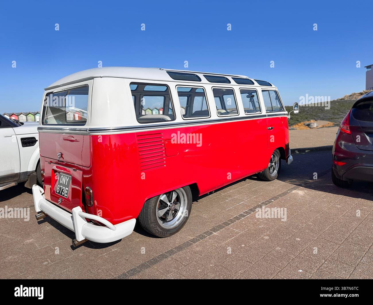 vintage 1967 two tone red & white VW volkswagen Type 2 T2 parked in Blyth Northumberland - Smartphone Captured Stock Image