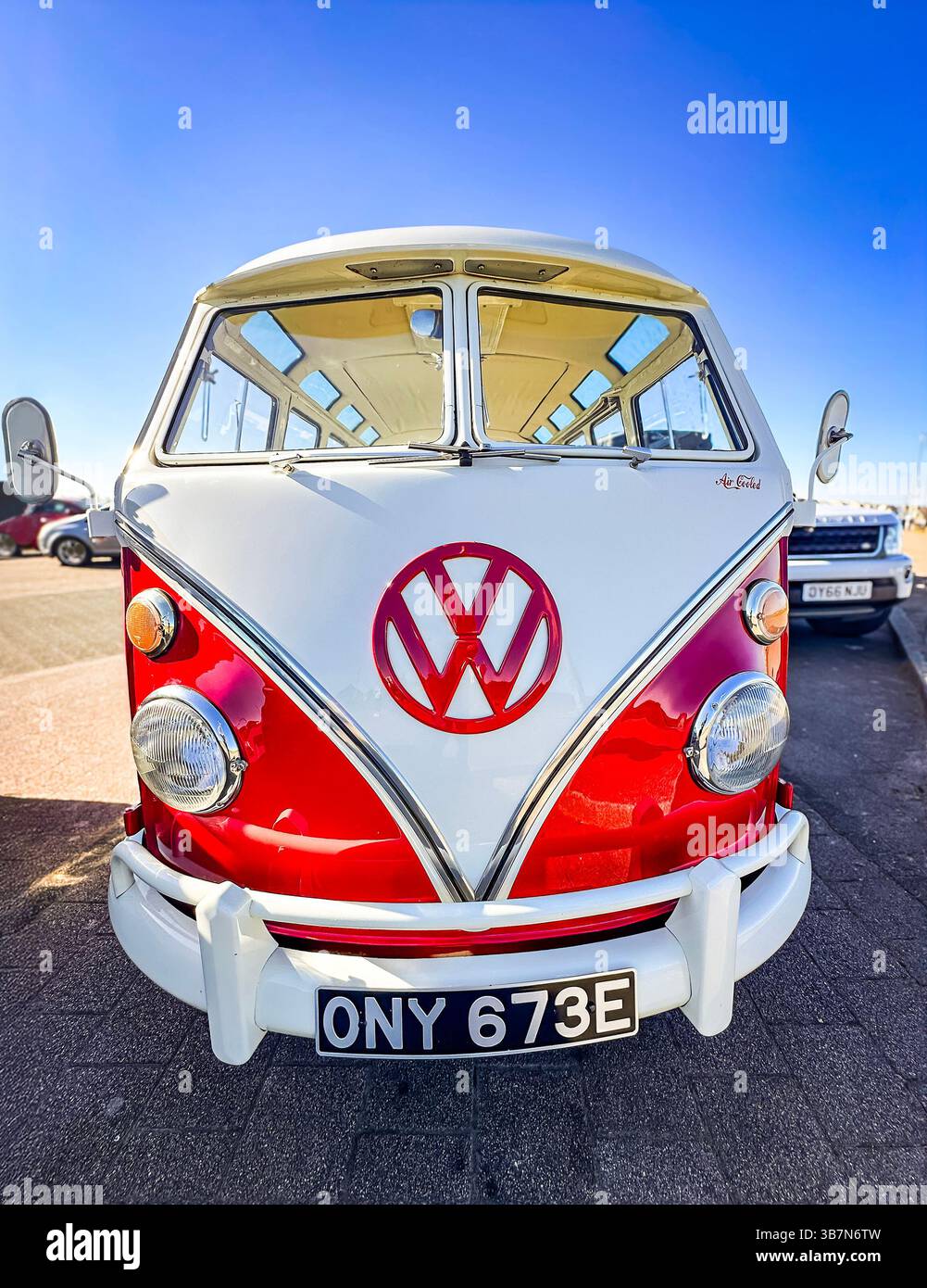 vintage 1967 two tone red & white VW volkswagen Type 2 T2 parked in Blyth Northumberland - Smartphone Captured Stock Image