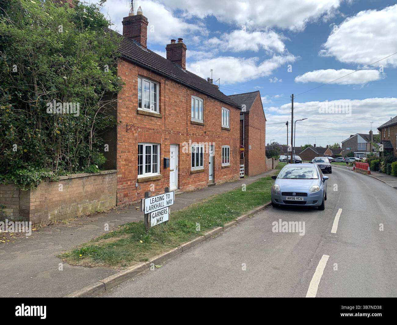 Harpole Northampton Northamptonshire UK England British village old stone buildings sign signs life town old ancient living style fashioned house - Smartphone Captured Stock Image