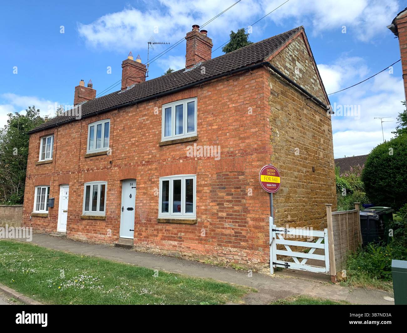 Harpole Northampton Northamptonshire UK England British village old stone buildings sign signs life town old ancient living style fashioned house - Smartphone Captured Stock Image