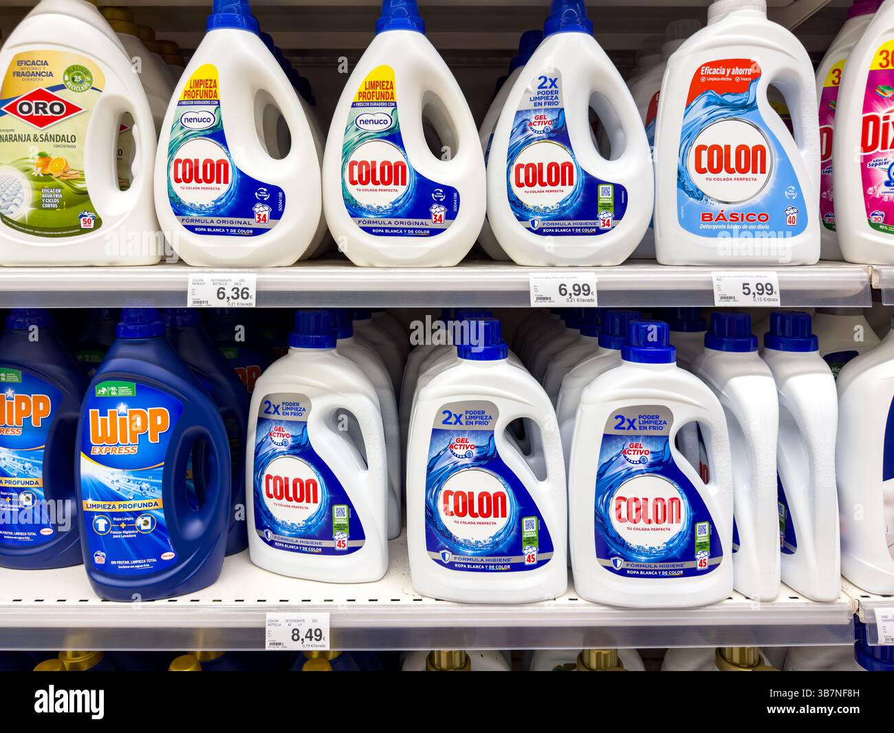spanish liquid washing laundry detergent  ORO Colon & Wipp brandson  supermarket shelves in Tenerife spain - Smartphone Captured Stock Image