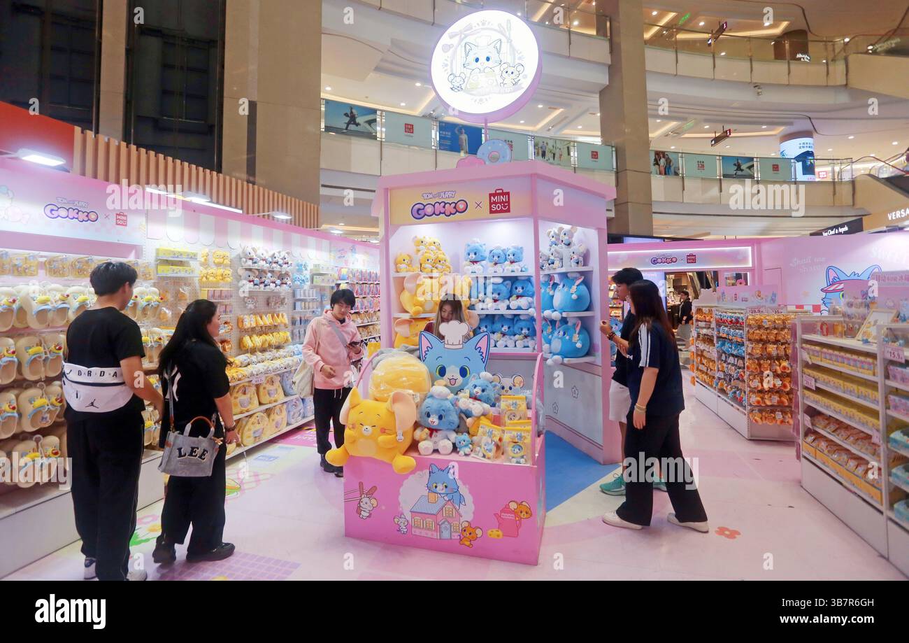 Shanghai, China. 30th Apr, 2025. Customers purchase cartoon Goods ...