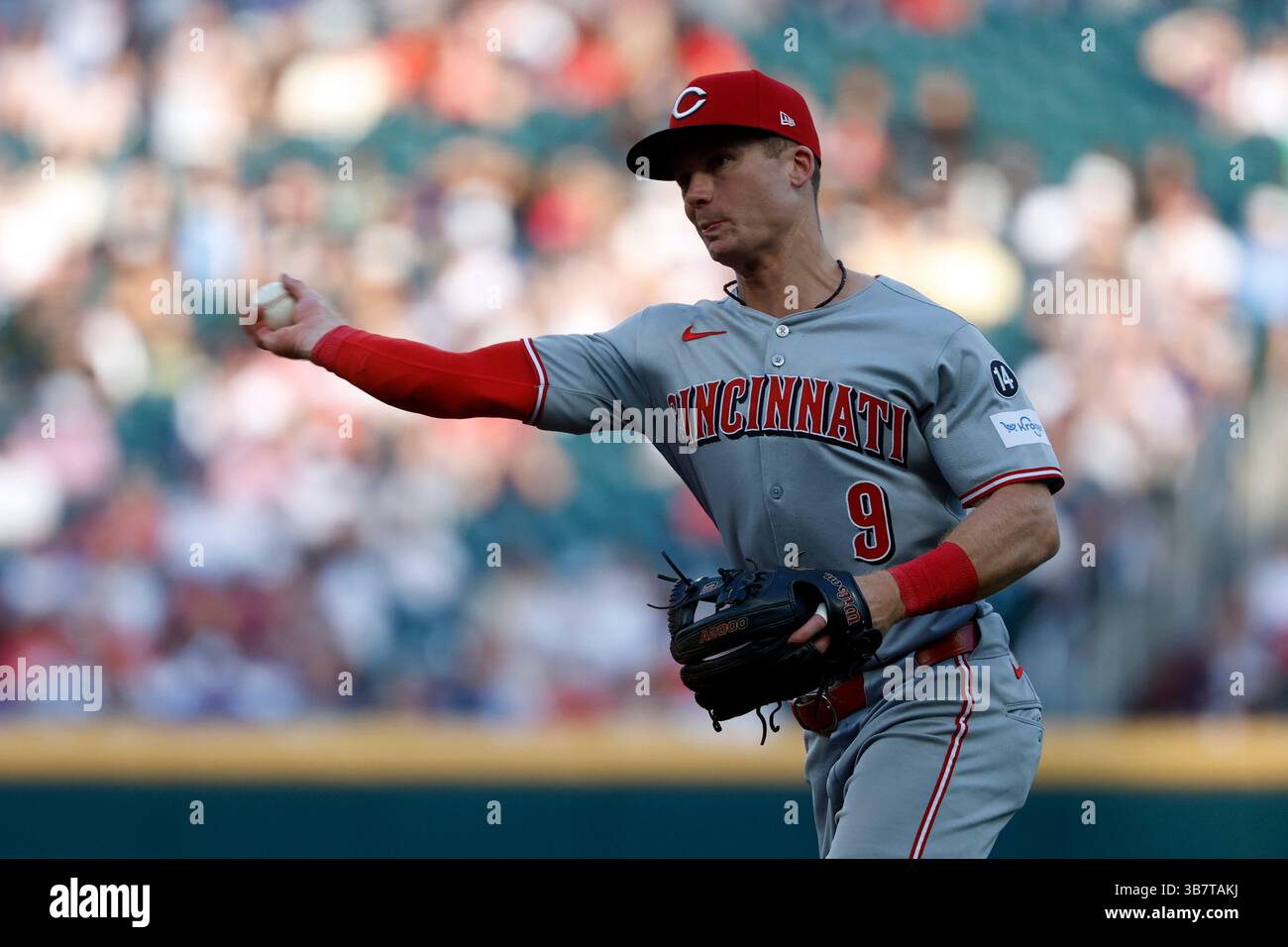 Cincinnati Reds second base Matt McLain throws to first for the out on ...