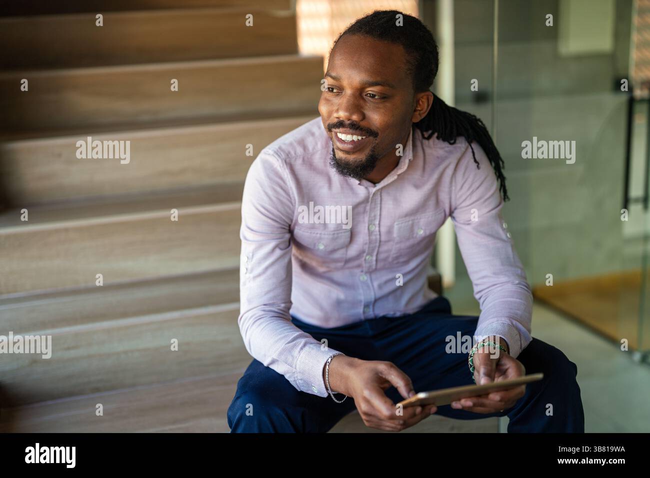 Happy software developer man working on project. Programming advanced code artificial intelligence Stock Photo