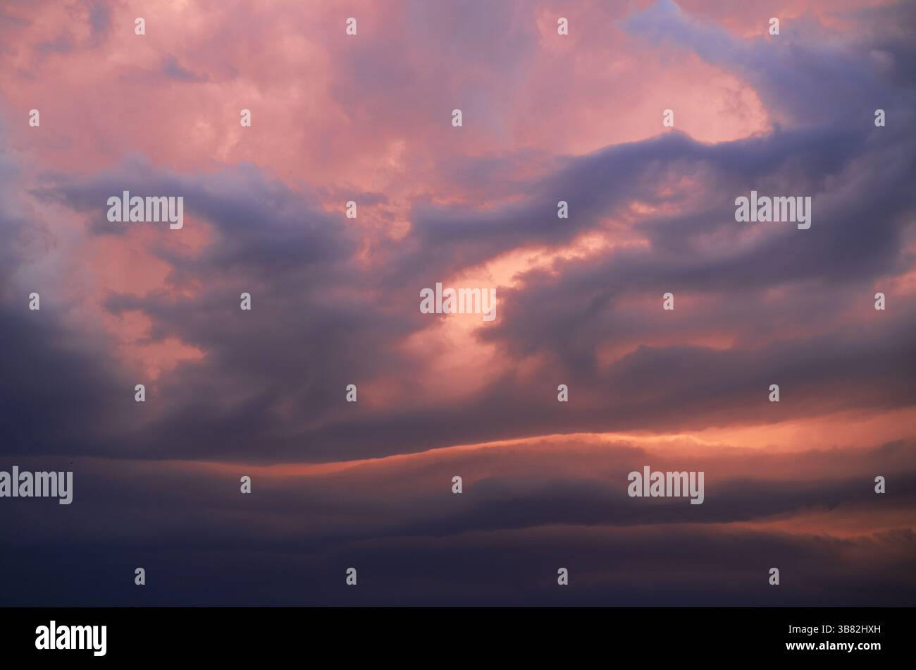 Beautiful stormy sky at sunset Stock Photo