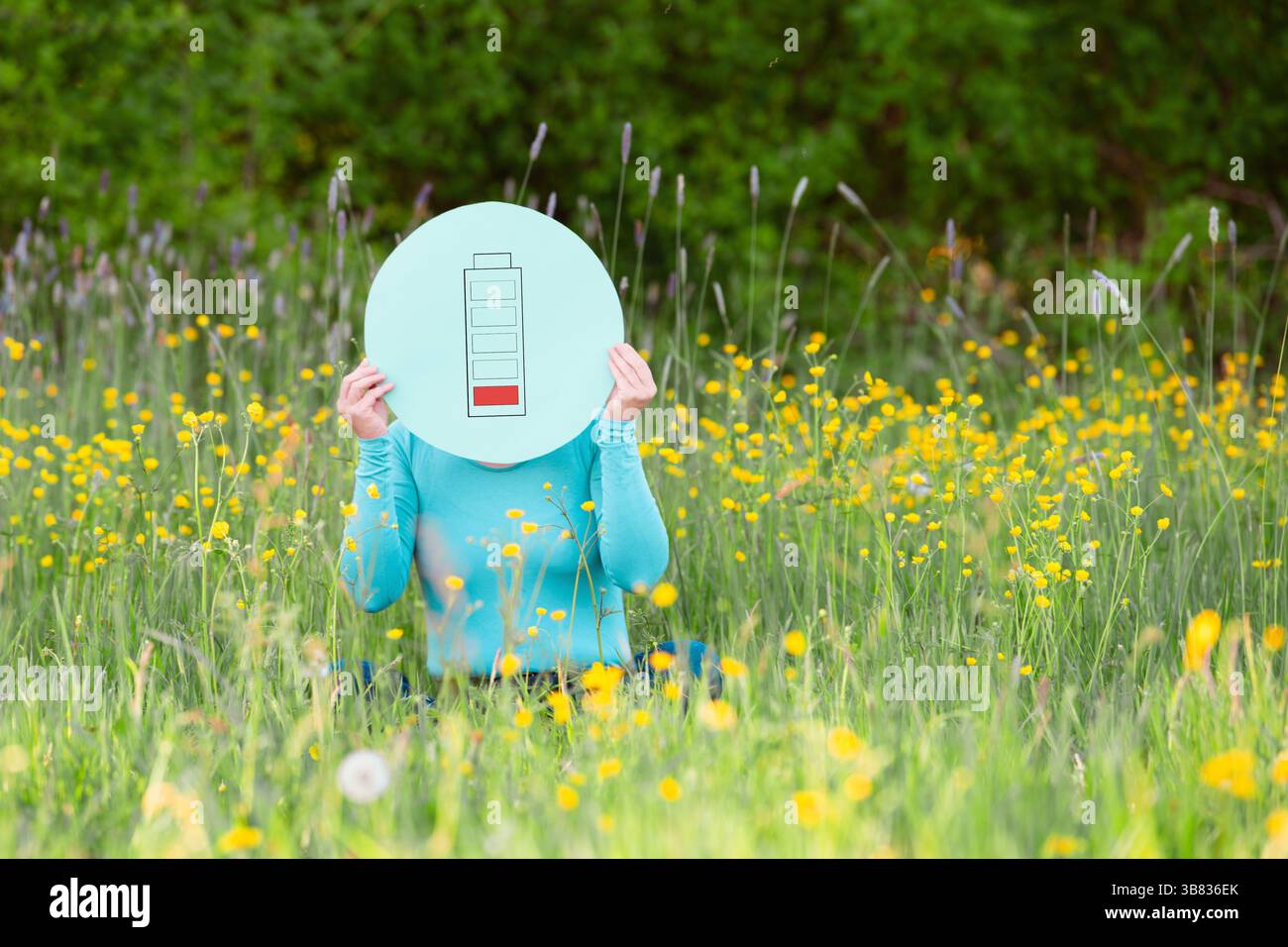Burnout syndrome, stress and exhaustion, work life balance, low energy, recharge power battery in nature, mental health by positive lifestyle Stock Photo