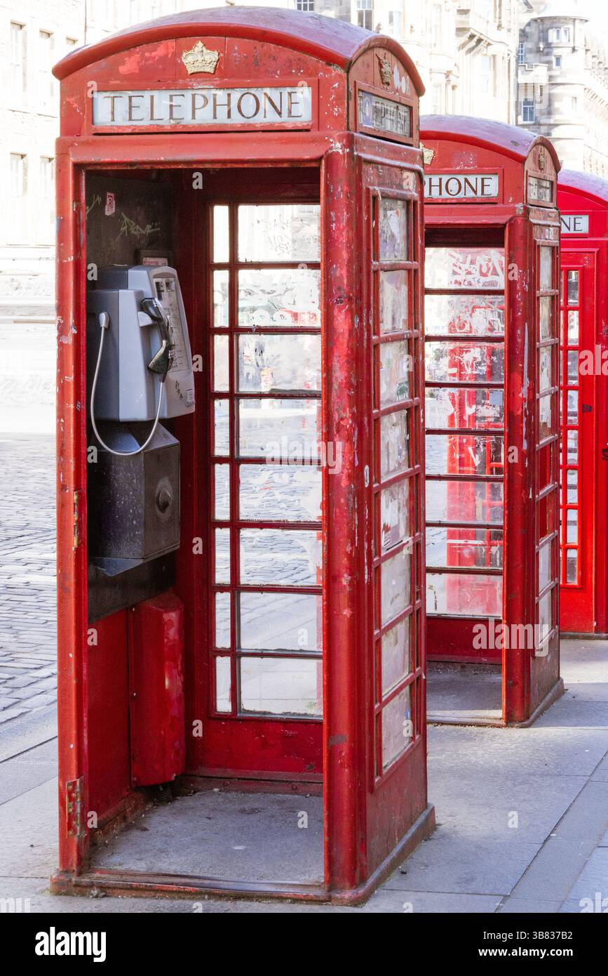 Sticker covered red telephone boxes on the Royal Mile in Edinburgh ...