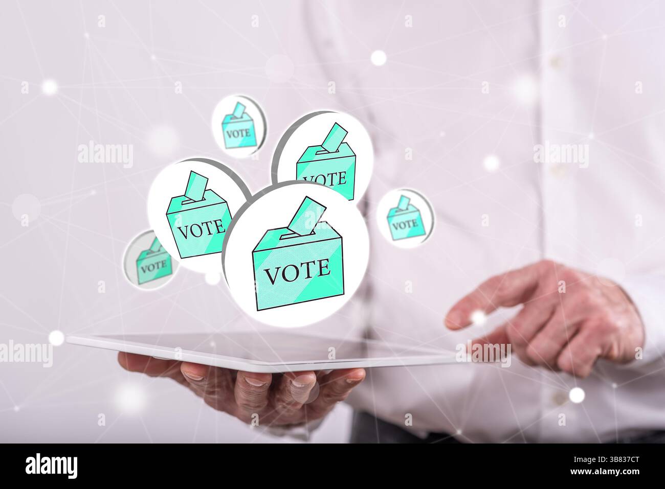 Vote concept above a tablet held by a man in background Stock Photo
