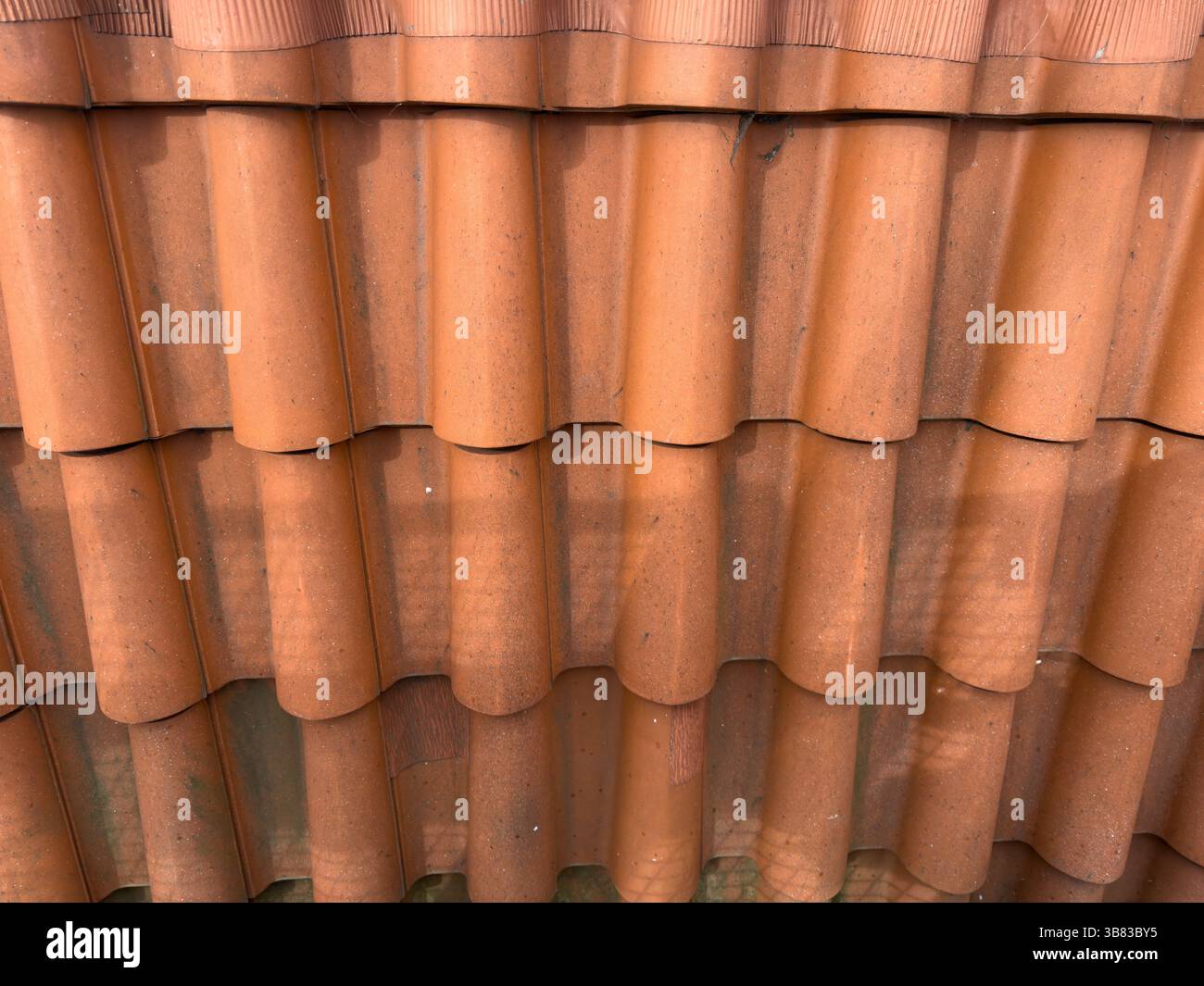 Terracotta roof tiles, showcasing traditional European architectural beauty - Smartphone Captured Stock Image