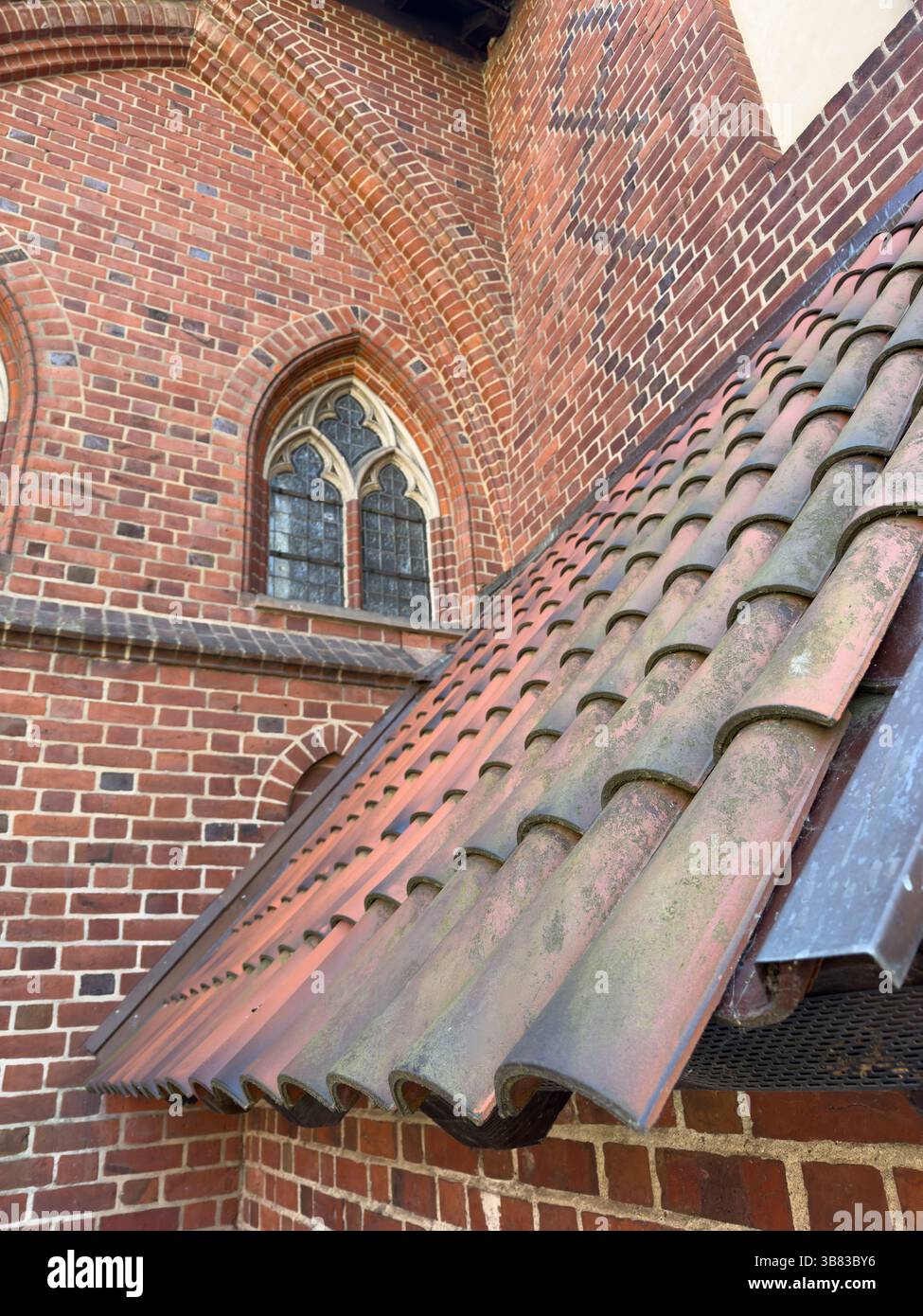 Aged terracotta roof tiles, showcasing traditional European architectural beauty - Smartphone Captured Stock Image