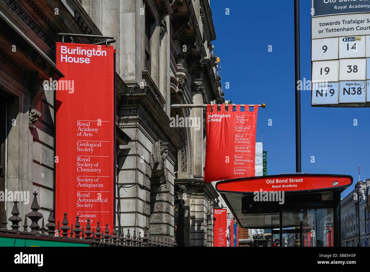 LONDON, UK - APRIL 29, 2025:  Colourful banner flags outside the Royal Academy of Arts (RA) Stock Photo