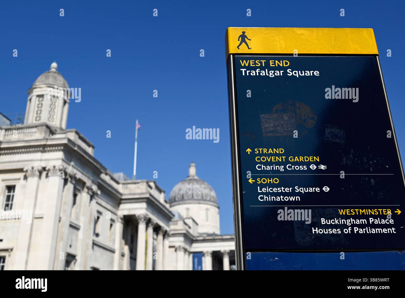 LONDON, UK - APRIL 29, 2025:  Tourist information sign with directions to Trafalgar Square, Covent Garden and Chinatown and National Gallery in backgr Stock Photo