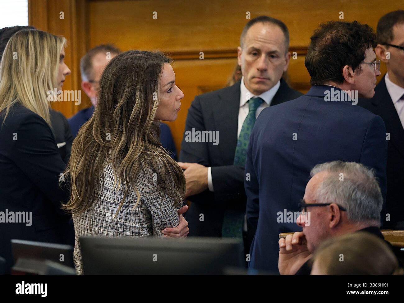 Karen Read listen to lawyers and Judge Cannone at the sidebar during ...