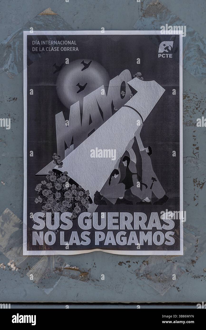 Activism poster in Cadiz, Spain promotes labor rights and peace in May, reflecting local historical context and social movements Stock Photo