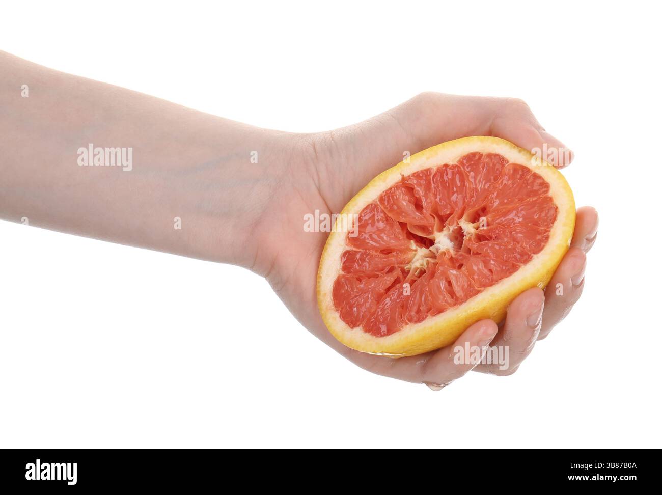 Woman squeezing grapefruit on white background, closeup Stock Photo