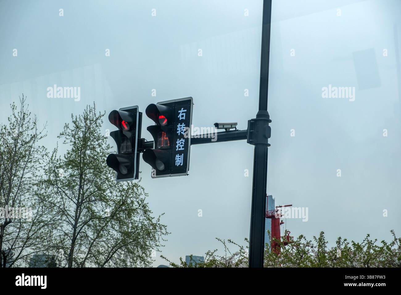Traffic signal in China, two red traffic lights for cars, Right Turn ...