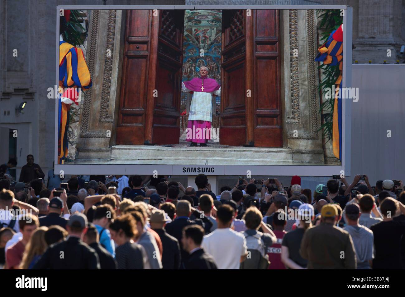 A giant screen in St Peter's Basilica shows Vatican Master of ...