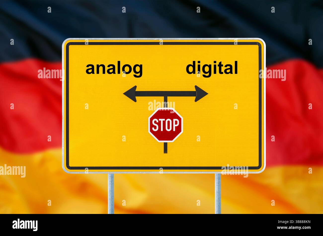 Vom analogen ins digitale Zeitalter Ein Verkehrsschild ist beschriftet mit analog und digital als Symbol der neuen Technologie über einer Deutschlandf Stock Photo