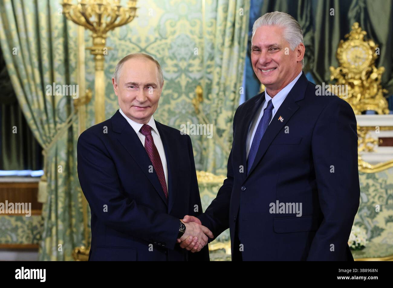 Russian President Vladimir Putin and Cuban President Miguel Diaz-Canel ...