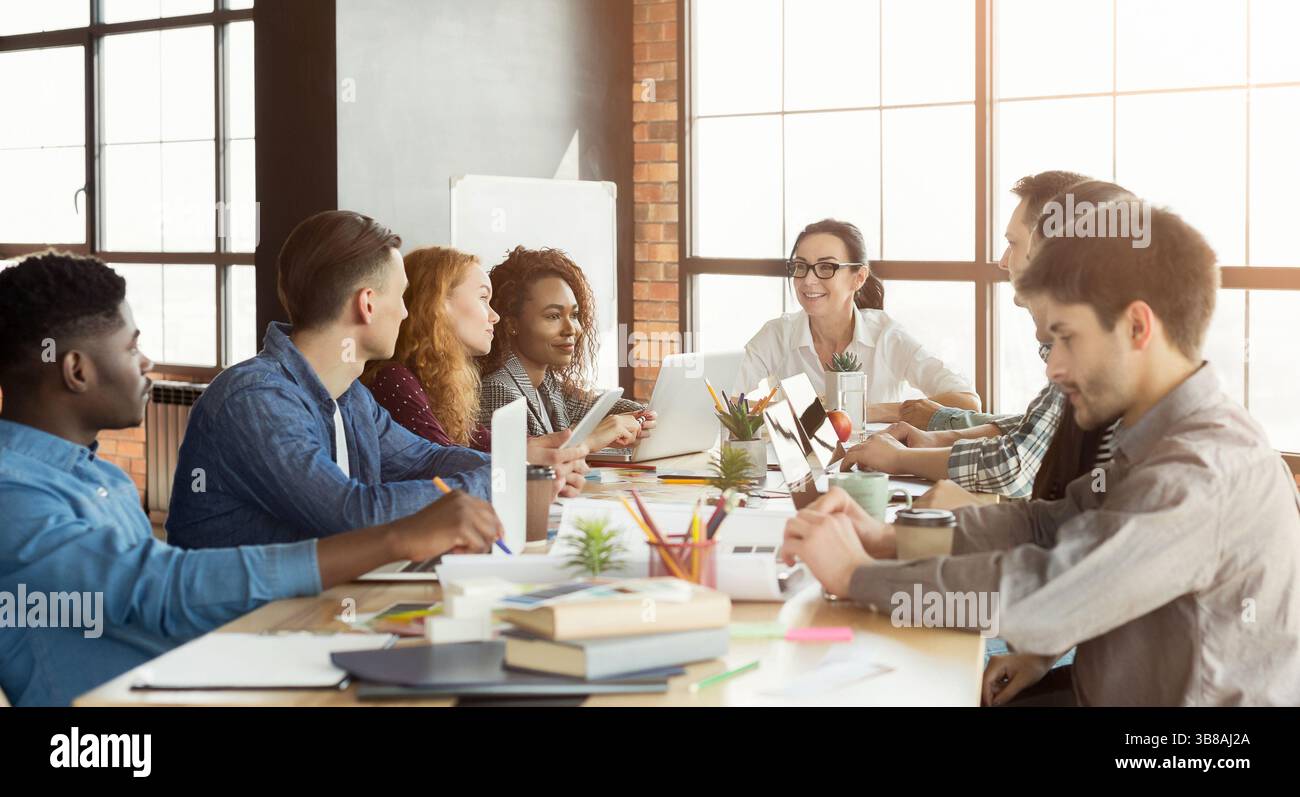 Group of young designers working with project Stock Photo