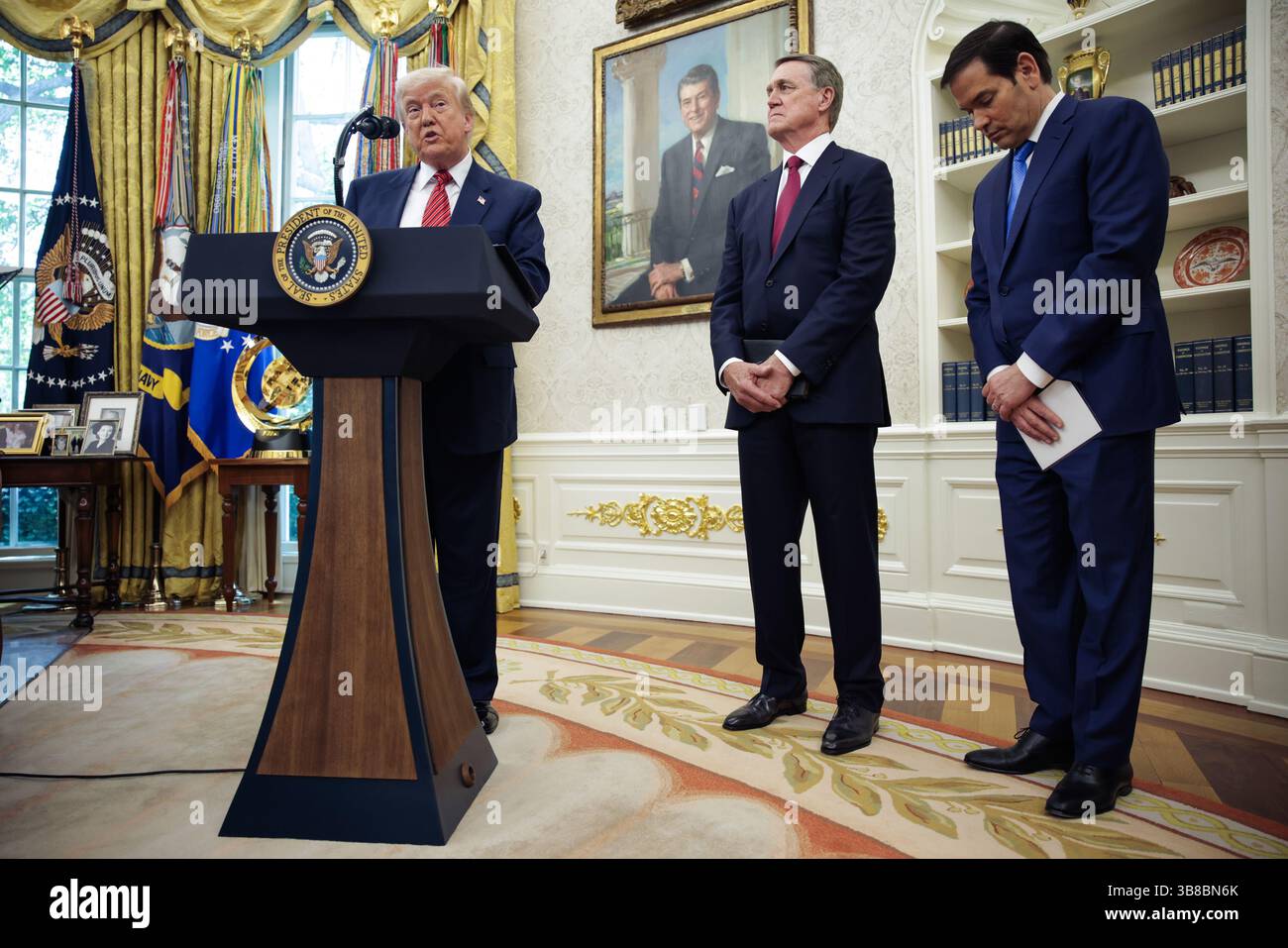 United States President Donald J Trump stands with former US Senator ...