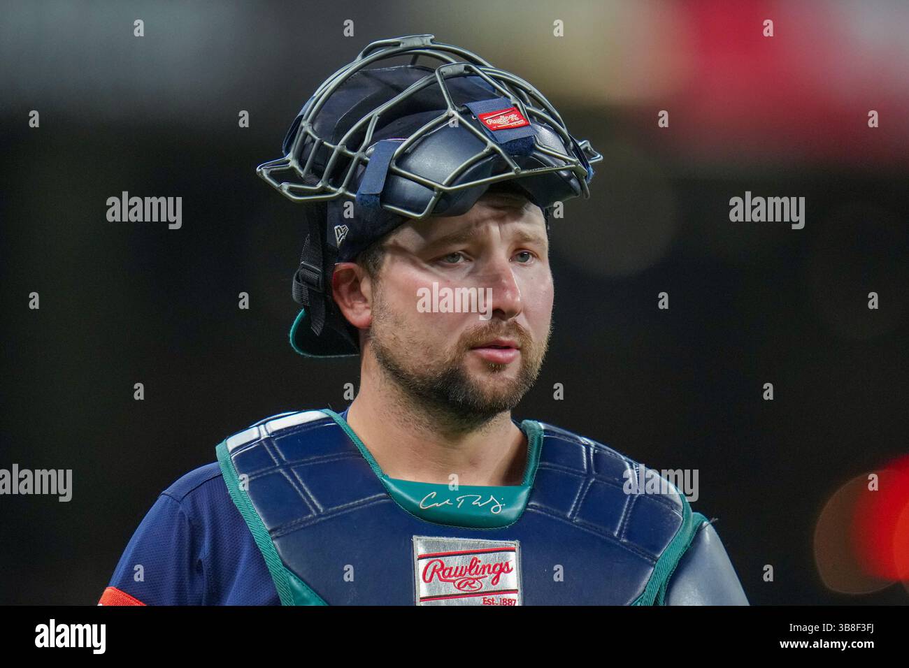Seattle Mariners catcher Cal Raleigh looks on prior to a baseball game ...