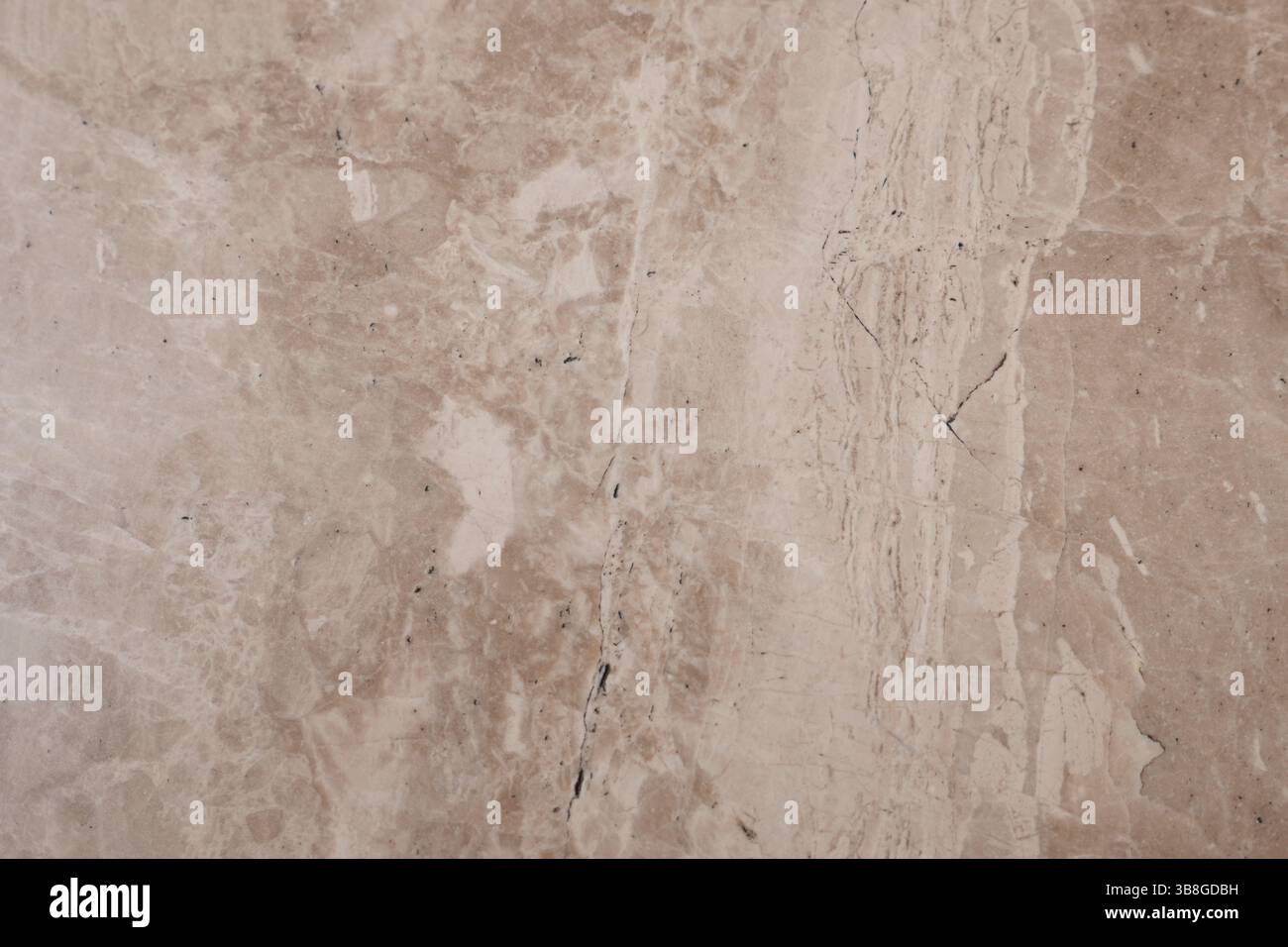 Textured beige marble surface showcasing natural patterns Stock Photo
