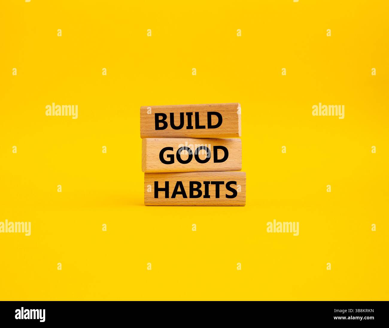 Build good habits symbol. Wooden blocks with words 'Build good habits ...